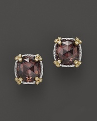 Raspberry crystal is framed in white sapphire-accented, 18K gold hearts on these stunning Judith Ripka earrings.