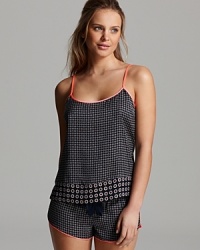 Geometric print and neon trim decorate this soft camisole from Juicy Couture. Geometric print and neon trim decorate this soft camisole from Juicy Couture.
