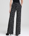 Polka dots abound on these flattering 10 Crosby Derek Lam wide-leg pants--the silhouette to be seen in this season.