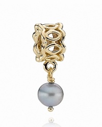 A delicate blue freshwater pearl dangles from a lacy 14K gold PANDORA charm. A delicate blue freshwater pearl dangles from a lacy 14K gold PANDORA charm.