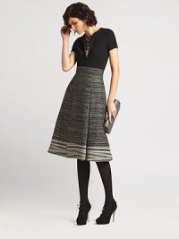 Finespun knit wool, embellished with a sparkling panel of sequins.Jewel necklineShort sleevesSequined insetBack keyhole button closureWoolDry cleanMade in ItalyModel shown is 5'10½ (177cm) wearing US size Small. Finespun knit wool, embellished with a sparkling panel of sequins.Jewel necklineShort sleevesSequined insetBack keyhole button closureWoolDry cleanMade in ItalyModel shown is 5'10½ (177cm) wearing US size Small.