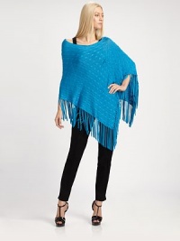This elegant layering piece is rendered in a finespun cable-knit silk, and trimmed in knotted fringe.Rib-knit necklineAllover cablesKnotted fringe trimSilkDry cleanImportedModel shown is 5'10 (177cm) wearing US size Small. This elegant layering piece is rendered in a finespun cable-knit silk, and trimmed in knotted fringe.Rib-knit necklineAllover cablesKnotted fringe trimSilkDry cleanImportedModel shown is 5'10 (177cm) wearing US size Small.