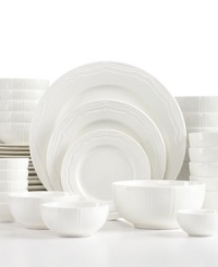 Make casual meals elegant too with the Beacon Hill dinnerware set. Easy-care porcelain with a fresh white glaze and scalloped accents lends timeless versatility to any setting.