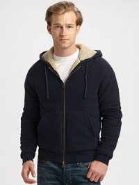 The ultimate in winter warmth and style marries the easy comfort of a cozy, lined cotton knit hoodie.Two-way zip frontAttached drawstring hoodKangaroo pocketsLining: polyesterCottonMachine washImportedAdditional Information Men's Shirts & Sweaters Size Guide The ultimate in winter warmth and style marries the easy comfort of a cozy, lined cotton knit hoodie.Two-way zip frontAttached drawstring hoodKangaroo pocketsLining: polyesterCottonMachine washImportedAdditional Information Men's Shirts & Sweaters Size Guide