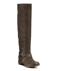Boutique 9's studded wrap boots echoe Wild West style. Tame it--just a little--with a feminine dress. Boutique 9's studded wrap boots echoe Wild West style. Tame it--just a little--with a feminine dress.