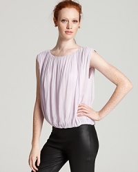 Gathered silk billows about an elasticized hem and lends a lovely look to this ethereal Alice + Olivia top. Gathered silk billows about an elasticized hem and lends a lovely look to this ethereal Alice + Olivia top.