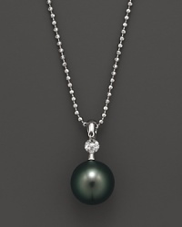 A timeless classic, this Tara Pearls necklace combines 18K white gold with a black Tahitian pearl, detailed with a sparkling diamond accent.