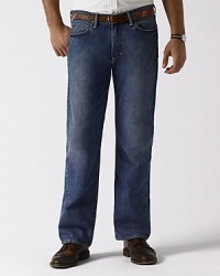 Classic-fitting jean in rugged cotton denim, washed for softness. Standard-rise belted waist, zip fly with signature shank. Classic straight leg. Five-pocket jean styling with metal rivets. Polo's signature canvas patch accents the back waist. Classic-fitting jean in rugged cotton denim, washed for softness. Standard-rise belted waist, zip fly with signature shank. Classic straight leg. Five-pocket jean styling with metal rivets. Polo's signature canvas patch accents the back waist.