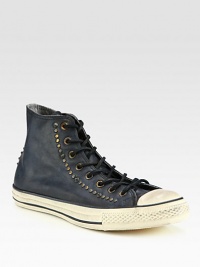 Vintage-inspired stud detail lends a rock-and-roll edge to this all star classic rendered in distressed leather with a supportive rubber sole.Leather upperLeather liningPadded insoleRubber soleImported Vintage-inspired stud detail lends a rock-and-roll edge to this all star classic rendered in distressed leather with a supportive rubber sole.Leather upperLeather liningPadded insoleRubber soleImported