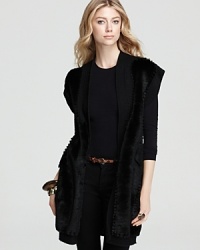 This 10 Crosby Derek Lam faux fur vest is rich with decadence and flaunts true glamour day or night. Wear it with tuxedo-stripe leggings or over a cocktail dress-either way you're dressed to impress.