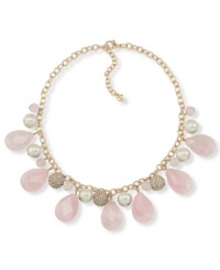 Carolee creates a warm appearance with this stunning necklace. Glass pearls, rose quartz beads and crystal-accented fireballs alternate on a chain crafted in gold tone mixed metal. Approximate length: 16 inches + 2-inch extender. Carolee creates a warm appearance with this stunning necklace. Glass pearls, rose quartz beads and crystal-accented fireballs alternate on a chain crafted in gold tone mixed metal. Approximate length: 16 inches + 2-inch extender.
