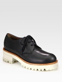 An elevated two-tone platform adds modern appeal to this menswear-inspired design of rich Italian leather. Rubber and foam heel, 1¾ (45mm)Rubber platform, 1 (25mm)Compares to a ¾ heel (20mm)Leather upperLeather liningRubber trek solePadded insoleMade in ItalyOUR FIT MODEL RECOMMENDS ordering one half size up as this style runs small. An elevated two-tone platform adds modern appeal to this menswear-inspired design of rich Italian leather. Rubber and foam heel, 1¾ (45mm)Rubber platform, 1 (25mm)Compares to a ¾ heel (20mm)Leather upperLeather liningRubber trek solePadded insoleMade in ItalyOUR FIT MODEL RECOMMENDS ordering one half size up as this style runs small.
