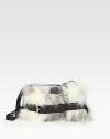 Ultra-luxurious fox fur in a petite, leather accented design.Adjustable shoulder strap, 7½-13 dropTop clasp closureOne inside zip pocketOne inside open pocketSatin lining10W X 5½H X 2DImported