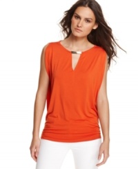 A keyhole and logo hardware adds eye-catching appeal to this bright MICHAEL Michael Kors top -- a stylish spring staple! A keyhole and logo hardware adds eye-catching appeal to this bright MICHAEL Michael Kors top -- a stylish spring staple!