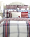 Red tartan plaid presents a smart accent made for this Tommy Hilfiger bedding collection. Navy twill piping around the edges mark this decorative pillow with sophisticated style.