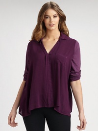 An airy top with raw-edge details that offers a relaxed, boxy fit.V-neckTab sleevesOne front pocketAbout 30 from shoulder to hemRayonHand washMade in USA An airy top with raw-edge details that offers a relaxed, boxy fit.V-neckTab sleevesOne front pocketAbout 30 from shoulder to hemRayonHand washMade in USA