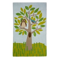 A wide-eyed owl perches on a leafy tree in shades of soft blue, green, brown and grey. A wide-eyed owl perches on a leafy tree in shades of soft blue, green, brown and grey.