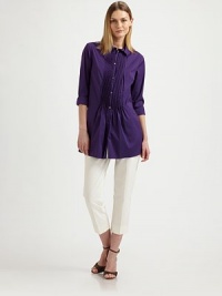 Crisp woven cotton, tailored in a flattering silhouette featuring delicate front pleats.Point collarButton frontFront pleatsLong sleeves with button cuffsAbout 29 from shoulder to hem83% cotton/14% polyamide/3% elastaneDry cleanMade in Italy of imported fabricModel shown is 5'10½ (179cm) wearing US size 4.OUR FIT MODEL RECOMMENDS ordering true size. Crisp woven cotton, tailored in a flattering silhouette featuring delicate front pleats.Point collarButton frontFront pleatsLong sleeves with button cuffsAbout 29 from shoulder to hem83% cotton/14% polyamide/3% elastaneDry cleanMade in Italy of imported fabricModel shown is 5'10½ (179cm) wearing US size 4.OUR FIT MODEL RECOMMENDS ordering true size.