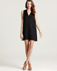 Effortlessly chic and truly sophisticated, this Theory dress features a deep v neck and abbreviated silhouette--the perfect look to have on hand when dinner dates call and cocktail parties beckon. Effortlessly chic and truly sophisticated, this Theory dress features a deep v neck and abbreviated silhouette--the perfect look to have on hand when dinner dates call and cocktail parties beckon.