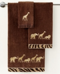 Embroidered animals in metallic gold embellish this Animal Parade hand towel, featuring coordinating cheetah chenille trim for a chic, safari-inspired look. Embroidered animals in metallic gold embellish this Animal Parade hand towel, featuring coordinating cheetah chenille trim for a chic, safari-inspired look.