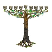 A creatively luxe essential for celebrating the holidays, this tree-inspired menorah glitters with dozens of hand-set Swarovski® crystals and glass gems set in hand-enameled cast pewter with an antique brash finish. A creatively luxe essential for celebrating the holidays, this tree-inspired menorah glitters with dozens of hand-set Swarovski® crystals and glass gems set in hand-enameled cast pewter with an antique brash finish.
