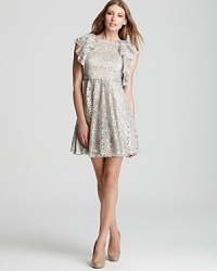In shimmering metallic lace, BCBGMAXAZRIA's Cynthia dress makes a festive party choice when teamed with dazzling earrings and feminine pumps. In shimmering metallic lace, BCBGMAXAZRIA's Cynthia dress makes a festive party choice when teamed with dazzling earrings and feminine pumps.