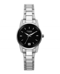Contemporary flair with ageless appeal. Watch by Carvelle by Bulova crafted of silver tone mixed metal bracelet and round case. Glossy black enamel dial features silver tone stick indices, date window at six o'clock, luminous hour and minute hands, second hand, and logo. Quartz movement. Water resistant to 30 meters. Two-year limited warranty. Contemporary flair with ageless appeal. Watch by Carvelle by Bulova crafted of silver tone mixed metal bracelet and round case. Glossy black enamel dial features silver tone stick indices, date window at six o'clock, luminous hour and minute hands, second hand, and logo. Quartz movement. Water resistant to 30 meters. Two-year limited warranty.