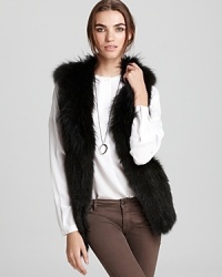 A Vince fox fur vest is the sumptuous addition your new season wardrobe warrants--luxurious and elegant with daily denim and evening dresses--and over your work sheath for a special lift. A Vince fox fur vest is the sumptuous addition your new season wardrobe warrants--luxurious and elegant with daily denim and evening dresses--and over your work sheath for a special lift.