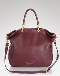 Functional meets fashion-forward in this supple leather shopper from MARC BY MARC JACOBS. Functional meets fashion-forward in this supple leather shopper from MARC BY MARC JACOBS.
