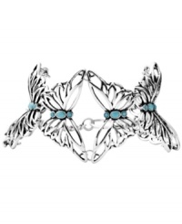 Wrap your wrist in butterfly after butterfly. Fossil's mixed metal bracelet links together vintage silver tone openwork butterflies that are accented by semi-precious turquoise stones. A lobster claw closure holds everything together. Approximate length: 7-3/4 inches. Wrap your wrist in butterfly after butterfly. Fossil's mixed metal bracelet links together vintage silver tone openwork butterflies that are accented by semi-precious turquoise stones. A lobster claw closure holds everything together. Approximate length: 7-3/4 inches.