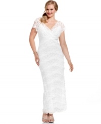Marina's plus size dress is breathtaking with a tiered lace overlay that's sheer at the shoulders and sleeves. Wear your hair swept up to show off the elegant scalloped V-neckline at the front and back. Marina's plus size dress is breathtaking with a tiered lace overlay that's sheer at the shoulders and sleeves. Wear your hair swept up to show off the elegant scalloped V-neckline at the front and back.