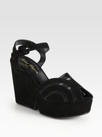 Cleverly crafted suede upper with semi-sheer mesh, enlivened by a sculpted wedge and an adjustable ankle strap. Self-covered suede wedge, 4½ (115mm)Covered platform, 1½ (40mm)Compares to a 3 heel (75mm)Suede and mesh upperLeather liningRubber solePadded insoleMade in FranceOUR FIT MODEL RECOMMENDS ordering true size. Cleverly crafted suede upper with semi-sheer mesh, enlivened by a sculpted wedge and an adjustable ankle strap. Self-covered suede wedge, 4½ (115mm)Covered platform, 1½ (40mm)Compares to a 3 heel (75mm)Suede and mesh upperLeather liningRubber solePadded insoleMade in FranceOUR FIT MODEL RECOMMENDS ordering true size.