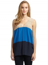 THE LOOKColorblock designAllover pleated constructionV-neck THE FITAbout 28 from shoulder to hemTHE MATERIALSilkCARE & ORIGINMachine washImportedModel shown is 5'8 (172½cm) wearing US size Small. THE LOOKColorblock designAllover pleated constructionV-neck THE FITAbout 28 from shoulder to hemTHE MATERIALSilkCARE & ORIGINMachine washImportedModel shown is 5'8 (172½cm) wearing US size Small.