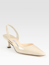 Glossy patent leather with a comfortable slingback and low-cut point toe. Self-covered heel, 2 (50mm)Patent leather upperLeather lining and solePadded insoleMade in Italy Glossy patent leather with a comfortable slingback and low-cut point toe. Self-covered heel, 2 (50mm)Patent leather upperLeather lining and solePadded insoleMade in Italy