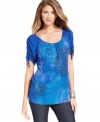 Update your fall wardrobe with this Style&co. scoop-neck top! A cool print and ruched sleeves add pop to your look.