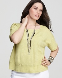 Tiny gunmetal studs lend subtle edge to this Eileen Fisher boxy top, rendered in a relaxed silhouette from tissue-weight linen. Tiny gunmetal studs lend subtle edge to this Eileen Fisher boxy top, rendered in a relaxed silhouette from tissue-weight linen.