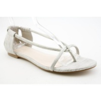 Calvin Klein Women's Roslyn Thong Flat Sandal,Silver,7.5 M US Calvin Klein Women's Roslyn Thong Flat Sandal,Silver,7.5 M US