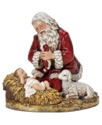 A glowing Santa Claus with rosy red cheeks kneels beside Baby Jesus in this figurine that you'll cherish for years to come. A glowing Santa Claus with rosy red cheeks kneels beside Baby Jesus in this figurine that you'll cherish for years to come.