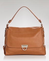 Exquisitely finished and perfectly proportioned. Salvatore Ferragamo's leather shoulder bag with silver tone hardware is an ever-chic piece that pulls together every look. Exquisitely finished and perfectly proportioned. Salvatore Ferragamo's leather shoulder bag with silver tone hardware is an ever-chic piece that pulls together every look.