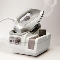 Steam Generator System by Rowenta looks like a regular iron but also functions as a garment steamer. The large water tank feeds into the iron for unlimited steam at the squeeze of a trigger. The laser soleplate glides over garments and the soft-touch handle makes ironing and steaming more comfortable. Model DG5030. Steam Generator System by Rowenta looks like a regular iron but also functions as a garment steamer. The large water tank feeds into the iron for unlimited steam at the squeeze of a trigger. The laser soleplate glides over garments and the soft-touch handle makes ironing and steaming more comfortable. Model DG5030.