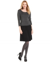 Sophisticated and sweet, this striking sweater dress from Anne Klein features a contrasting bodice and skirt and a drop-waist silhouette. Sophisticated and sweet, this striking sweater dress from Anne Klein features a contrasting bodice and skirt and a drop-waist silhouette.
