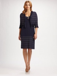 Romantic ruffles add fantastic texture to this nautical-themed style. Hook-and-eye closureThree-quarter sleevesPull-on styleAbout 17 from shoulder to hem92% viscose/8% nylonDry cleanMade in Italy Romantic ruffles add fantastic texture to this nautical-themed style. Hook-and-eye closureThree-quarter sleevesPull-on styleAbout 17 from shoulder to hem92% viscose/8% nylonDry cleanMade in Italy