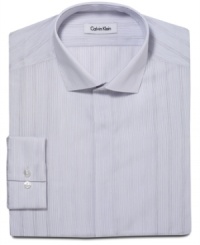 Fine lines. A subtle stripe and slim fit gives this Calvin Klein shirt an ultra-modern look. Fine lines. A subtle stripe and slim fit gives this Calvin Klein shirt an ultra-modern look.