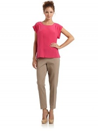 THE LOOKRound necklineShort cuffed sleevesPleated shouldersBack zip closureTHE FITAbout 22 from shoulder to hemTHE MATERIALSilkCARE & ORIGINDry cleanImportedModel shown is 5'9 (175cm) wearing US size 4. THE LOOKRound necklineShort cuffed sleevesPleated shouldersBack zip closureTHE FITAbout 22 from shoulder to hemTHE MATERIALSilkCARE & ORIGINDry cleanImportedModel shown is 5'9 (175cm) wearing US size 4.