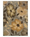 A series of modern florals appear in earthy hues upon this chic Palermo area rug from Sphinx. Woven of durable, long nylon fibers that also offer a soft hand, it serves to enliven any space with a rich, luxurious color palette.