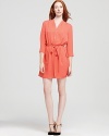 An elegant Theory dress, belted for a classic shirtdress silhouette, in whisper-light silk.