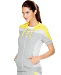 Warm up your workout in Puma's short-sleeved jacket. Colorblocked mesh panels recall sporty vintage styling -- so cool! Warm up your workout in Puma's short-sleeved jacket. Colorblocked mesh panels recall sporty vintage styling -- so cool!