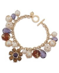 Charm your friends with this bracelet from Carolee. Features clusters of colorful epoxy stones and glass accents. Crafted in 12k gold-plated mixed metal with a toggle closure. Approximate length: 7-3/4 inches. Charm your friends with this bracelet from Carolee. Features clusters of colorful epoxy stones and glass accents. Crafted in 12k gold-plated mixed metal with a toggle closure. Approximate length: 7-3/4 inches.