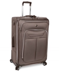 A spin, spin situation! You can't lose with Revo's durable and versatile expandable suitcase. Set on 8 easy-glide 360º wheels, this bag rolls with the punches & packs in everything you can't live without and keeps it in perfect order, so you arrive cool, calm & composed. A side-bound construction and tri-tone exterior make dependability and style a part of every itinerary. A spin, spin situation! You can't lose with Revo's durable and versatile expandable suitcase. Set on 8 easy-glide 360º wheels, this bag rolls with the punches & packs in everything you can't live without and keeps it in perfect order, so you arrive cool, calm & composed. A side-bound construction and tri-tone exterior make dependability and style a part of every itinerary.