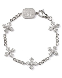 Add glamor and attitude to your look with one striking piece like this delicate sterling silver and cubic zirconia bangle from Queen Baby. Add glamor and attitude to your look with one striking piece like this delicate sterling silver and cubic zirconia bangle from Queen Baby.